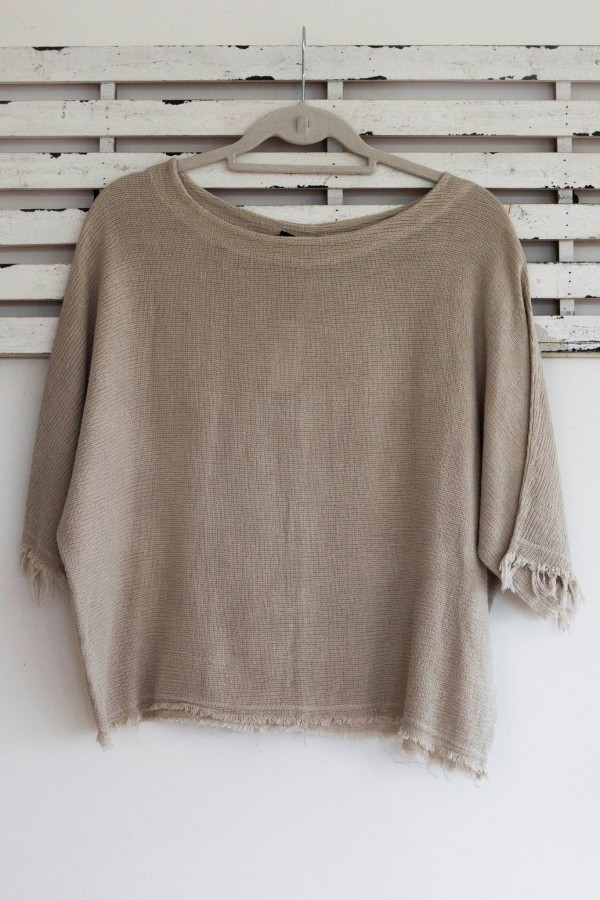 Natural woven linen top with frayed sleeves and hem